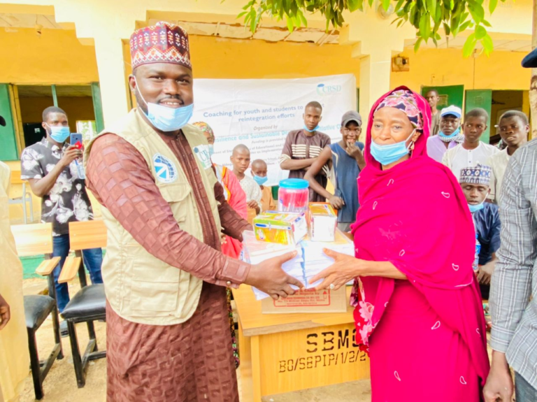 Presentation of learning materials to support education in Abbaganaram Secondary school in Shehuri community, Maiduguri, Borno State Nigeria